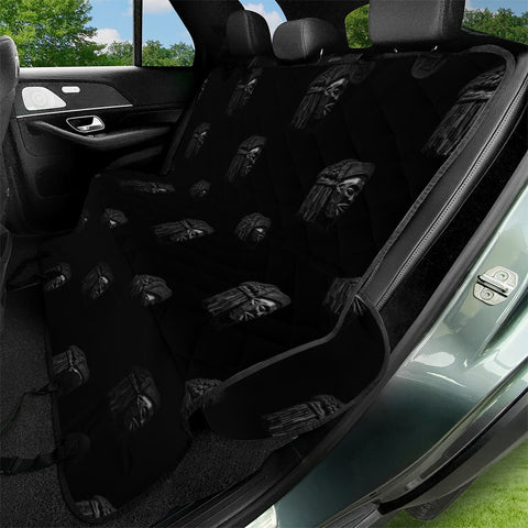 Image of African Head Sculpture Over Black Pet Seat Covers